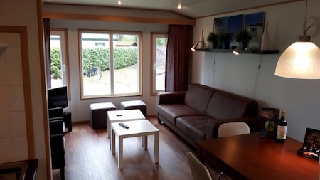 Woonkamer - Vakantiepark de Luttenberg Woonkamer - Vakantiepark de Luttenberg