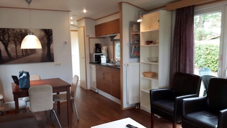 Woonkamer - Vakantiepark de Luttenberg Woonkamer - Vakantiepark de Luttenberg