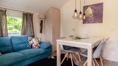 Woonkamer - Vakantiepark Mölke Woonkamer - Vakantiepark Mölke