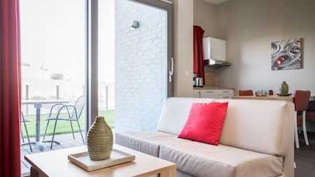 Wohn-Schlafzimmer - Holiday Suites Zeebrugge