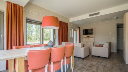 Woonkamer - Holiday Suites Westende Woonkamer - Holiday Suites Westende