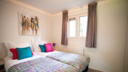 Slaapkamer - EuroParcs Beekbergen Slaapkamer - EuroParcs Beekbergen