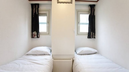 Schlafzimmer - EuroParcs De Hooge Veluwe Schlafzimmer - EuroParcs De Hooge Veluwe