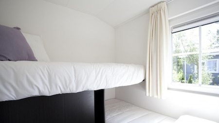 Slaapkamer - EuroParcs Buitenhuizen Slaapkamer - EuroParcs Buitenhuizen