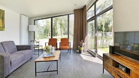 Wohnzimmer - Vakantiepark de Lochemse Berg Wohnzimmer - Vakantiepark de Lochemse Berg