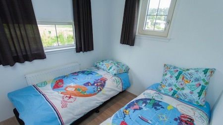 Slaapkamer - EuroParcs Resort de Achterhoek Slaapkamer - EuroParcs Resort de Achterhoek