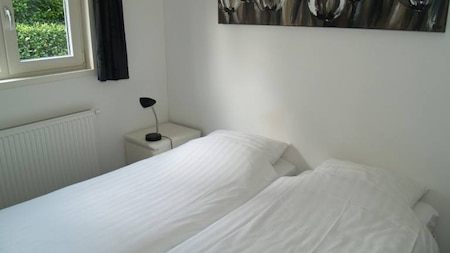 Slaapkamer - EuroParcs Resort de Achterhoek Slaapkamer - EuroParcs Resort de Achterhoek