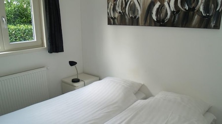 Slaapkamer - EuroParcs Resort Reestervallei Slaapkamer - EuroParcs Resort Reestervallei