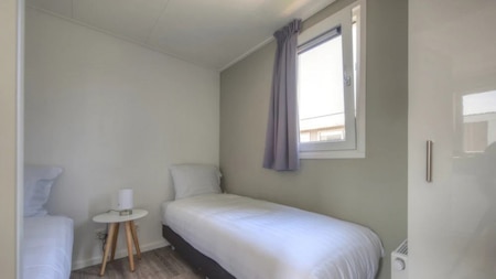 Slaapkamer - EuroParcs Resort Poort van Zeeland Slaapkamer - EuroParcs Resort Poort van Zeeland