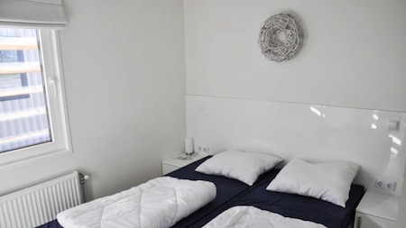 Slaapkamer - EuroParcs Resort De Kraaijenbergse Plassen