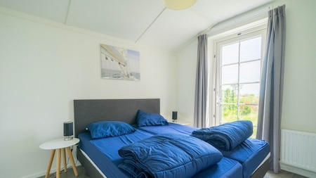 Slaapkamer - EuroParcs Resort Poort van Amsterdam Slaapkamer - EuroParcs Resort Poort van Amsterdam