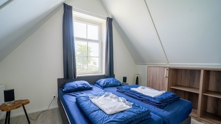 Slaapkamer - EuroParcs Resort Poort van Amsterdam Slaapkamer - EuroParcs Resort Poort van Amsterdam