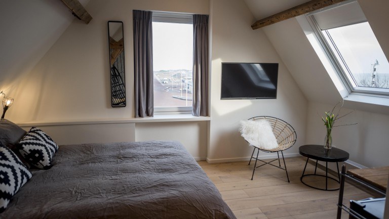Deluxe kamer met zeezicht - Loods Logement