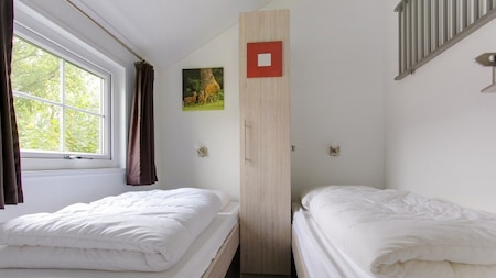 Slaapkamer - EuroParcs Resort de Utrechtse Heuvelrug Slaapkamer - EuroParcs Resort de Utrechtse Heuvelrug