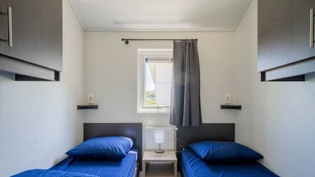 Slaapkamer - EuroParcs Resort De Utrechtse Heuvelrug Slaapkamer - EuroParcs Resort De Utrechtse Heuvelrug