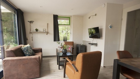 Woonkamer - RCN Vakantiepark de Roggeberg Woonkamer - RCN Vakantiepark de Roggeberg