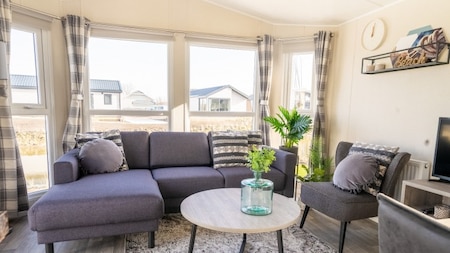 Woonkamer - Vakantiepark Aan de Maas Woonkamer - Vakantiepark Aan de Maas