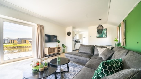 Woonkamer - Vakantiepark Aan de Maas Woonkamer - Vakantiepark Aan de Maas