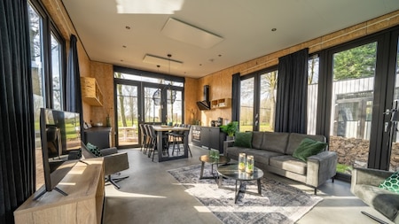 Woonkamer - Vakantiepark Aan de Maas Woonkamer - Vakantiepark Aan de Maas