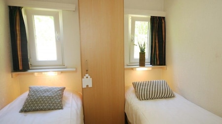 Slaapkamer - RCN Vakantiepark de Roggeberg Slaapkamer - RCN Vakantiepark de Roggeberg
