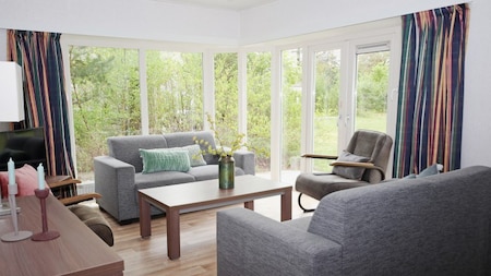 Woonkamer - RCN Vakantiepark de Roggeberg Woonkamer - RCN Vakantiepark de Roggeberg