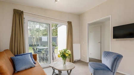 Woonkamer - Roompot Vakantiepark Kijkduin