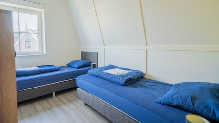 Slaapkamer - EuroParcs Poort van Amsterdam Slaapkamer - EuroParcs Poort van Amsterdam