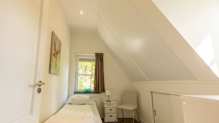 Slaapkamer - EuroParcs de Achterhoek Slaapkamer - EuroParcs de Achterhoek