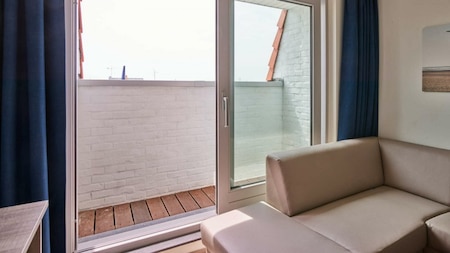 Wohnzimmer - Holiday Suites Zeebrugge