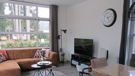 Woonkamer - Recreatiedorp de Ossenberg Woonkamer - Recreatiedorp de Ossenberg