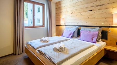 Slaapkamer - Landal Alpine Lodge Lenzerheide Slaapkamer - Landal Alpine Lodge Lenzerheide