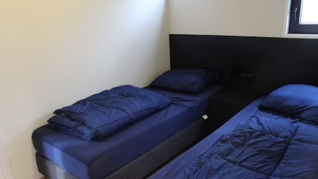 Slaapkamer - Vakantiepark Aan de Maas Slaapkamer - Vakantiepark Aan de Maas