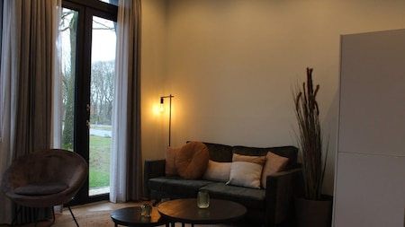 Woonkamer - Vakantiepark Aan de Maas Woonkamer - Vakantiepark Aan de Maas