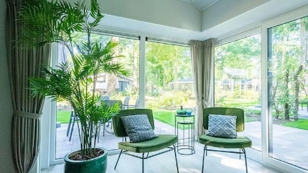 Woonkamer - Vakantiepark Aan de Maas Woonkamer - Vakantiepark Aan de Maas