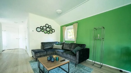 Woonkamer - Vakantiepark Aan de Maas Woonkamer - Vakantiepark Aan de Maas