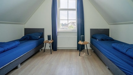 Slaapkamer - EuroParcs Poort van Amsterdam Slaapkamer - EuroParcs Poort van Amsterdam