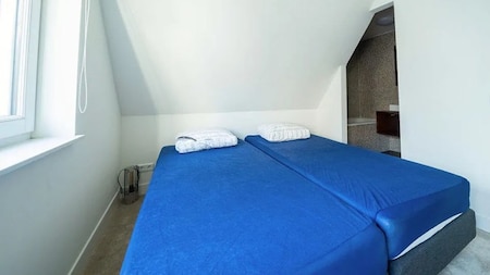 Slaapkamer - EuroParcs Poort van Amsterdam Slaapkamer - EuroParcs Poort van Amsterdam