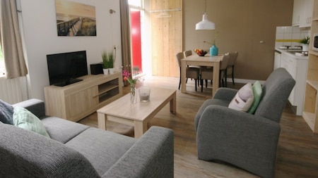 Woonkamer - RCN Vakantiepark Toppershoedje Woonkamer - RCN Vakantiepark Toppershoedje