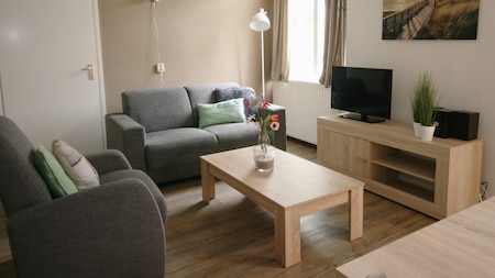 Woonkamer - RCN Vakantiepark Toppershoedje Woonkamer - RCN Vakantiepark Toppershoedje