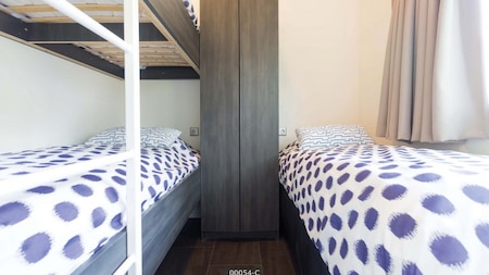 Slaapkamer - TopParken Landgoed De Scheleberg Slaapkamer - TopParken Landgoed De Scheleberg