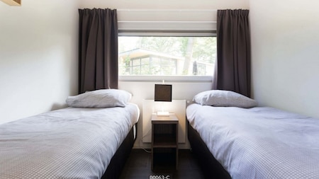 Slaapkamer - TopParken Landgoed de Scheleberg Slaapkamer - TopParken Landgoed de Scheleberg