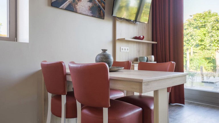 Woonkamer - Holiday Suites Westende