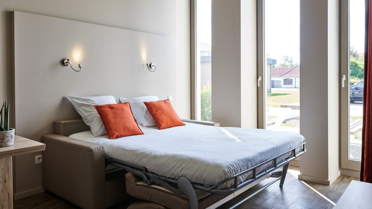 Woonkamer - Holiday Suites Westende