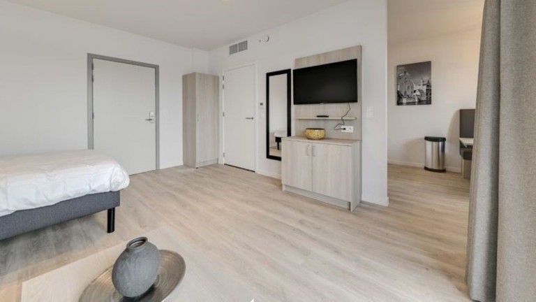 Woonkamer - Holiday Suites Jabbeke