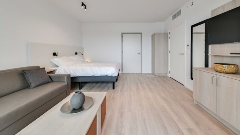 Woonkamer - Holiday Suites Jabbeke