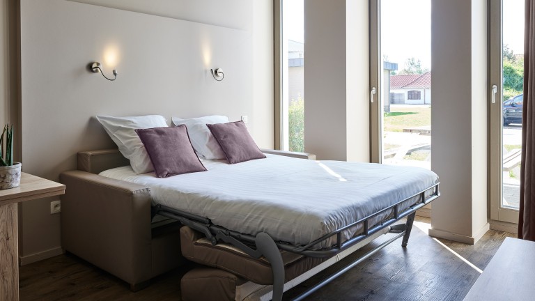 Woonkamer - Holiday Suites Jabbeke