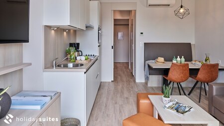 Woonkamer - Holiday Suites Jabbeke