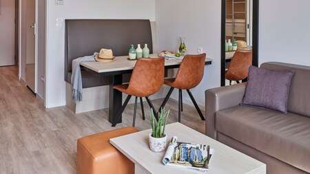 Woonkamer - Holiday Suites Jabbeke