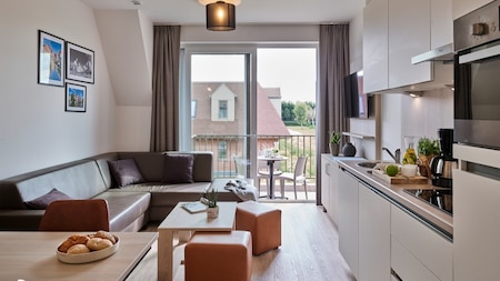 Woonkamer - Holiday Suites Jabbeke