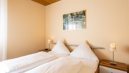 Slaapkamer - Gemünder Ferienpark Salzberg Slaapkamer - Gemünder Ferienpark Salzberg